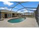 Inviting screened pool with ample deck space for lounging at 1170 Richter St, Port Charlotte, FL 33952