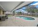 Relaxing screened pool and patio area, perfect for outdoor entertaining at 1170 Richter St, Port Charlotte, FL 33952