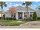 Beautiful house with a welcoming front porch and lush landscaping at 11712 Golden Bay Pl, Bradenton, FL 34211