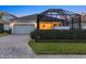 Single-story home with attached garage and landscaped yard at 11712 Golden Bay Pl, Bradenton, FL 34211