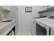 Convenient laundry room with modern washer and dryer at 11712 Golden Bay Pl, Bradenton, FL 34211