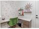 Charming home office with built-in shelves and flamingo wallpaper at 11712 Golden Bay Pl, Bradenton, FL 34211