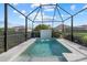 Inviting, refreshing pool with a water feature and screened enclosure at 11712 Golden Bay Pl, Bradenton, FL 34211