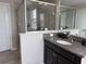 Bathroom with large walk-in shower and granite vanity at 12315 Ballentrae Forest Dr, Riverview, FL 33579