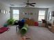 Spacious playroom with toys, a ball, and ample space for children to play at 12315 Ballentrae Forest Dr, Riverview, FL 33579