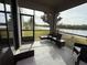 Relaxing screened porch overlooking a lake at 12315 Ballentrae Forest Dr, Riverview, FL 33579