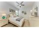 Bright bedroom featuring a comfortable bed and a large dresser at 13823 Swiftwater Way, Bradenton, FL 34211