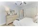 Well-lit bedroom with a queen-size bed and ample closet space at 13823 Swiftwater Way, Bradenton, FL 34211