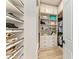 Well-organized closet with ample shelving and hanging space at 13823 Swiftwater Way, Bradenton, FL 34211