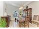 Formal dining room with wood furniture and a chandelier at 13823 Swiftwater Way, Bradenton, FL 34211