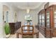 Elegant dining room featuring a large table and hutch at 13823 Swiftwater Way, Bradenton, FL 34211