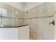 Large walk-in shower with neutral tile and glass enclosure at 13823 Swiftwater Way, Bradenton, FL 34211