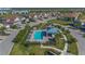 Community pool with lounge chairs at 14081 Black Beauty Dr # 1111, Punta Gorda, FL 33955