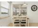 Dining area featuring tile floors, natural lighting and a window overlooking the lake at 14081 Black Beauty Dr # 1111, Punta Gorda, FL 33955