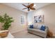 Relaxing living room with comfy couch and neutral color scheme at 14333 Stirling Dr, Lakewood Ranch, FL 34202