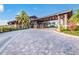 Elegant community clubhouse entrance and driveway at 14614 Newtonmore Ln, Lakewood Ranch, FL 34202