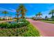 Community entrance with a fountain and brick-paved road, creating a grand arrival at 14614 Newtonmore Ln, Lakewood Ranch, FL 34202