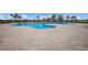 Community pool with lap lanes and a playful design at 14614 Newtonmore Ln, Lakewood Ranch, FL 34202