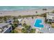 Aerial view of community pool and beach access, steps from the ocean at 1555 Tarpon Center Dr # 261, Venice, FL 34285