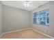 Bedroom with ceiling fan and window at 1910 Scarlett Ave, North Port, FL 34289