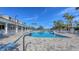 Resort-style pool with plenty of lounge chairs at 1910 Scarlett Ave, North Port, FL 34289