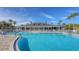 Enjoy this refreshing community pool and surrounding clubhouse at 1910 Scarlett Ave, North Port, FL 34289