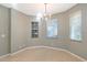 Bright dining room with tile floors and a chandelier at 1910 Scarlett Ave, North Port, FL 34289