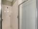 Clean shower with white tile and glass enclosure at 1910 Scarlett Ave, North Port, FL 34289