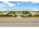 Community building with palm trees at 2107 Palma Sola Blvd # 13, Bradenton, FL 34209