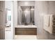 Modern bathroom with double sinks and a walk-in shower at 2188 Fruitville Rd, Sarasota, FL 34237