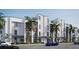 Modern townhouses with clean lines and palm trees at 2188 Fruitville Rd, Sarasota, FL 34237