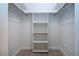 Large closet with shelving and hanging rods at 2291 Pueblo Ln # V46, Sarasota, FL 34231