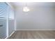 Empty dining area featuring light walls and wood-look floors at 2291 Pueblo Ln # V46, Sarasota, FL 34231