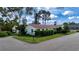 Attractive single story home with red tile roof and lush landscaping at 2291 Pueblo Ln # V46, Sarasota, FL 34231