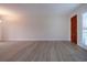 Bright living room with light walls and wood-look flooring at 2291 Pueblo Ln # V46, Sarasota, FL 34231