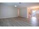 Open living room with light flooring and access to kitchen at 2291 Pueblo Ln # V46, Sarasota, FL 34231