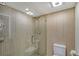 Bright bathroom featuring a glass shower and updated fixtures at 2301 Gulf Of Mexico Dr # 52N, Longboat Key, FL 34228