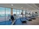 Fitness center with ocean views and modern equipment at 2301 Gulf Of Mexico Dr # 52N, Longboat Key, FL 34228