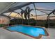 Inviting screened pool area, perfect for relaxation at 232 Venice Palms Blvd, Venice, FL 34292