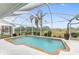 Refreshing screened pool and expansive backyard view at 232 Venice Palms Blvd, Venice, FL 34292