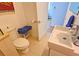 Small bathroom with updated sink and toilet at 2335 Novus St, Sarasota, FL 34237