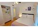 Charming bedroom with built-in shelving and hardwood floors at 2335 Novus St, Sarasota, FL 34237