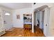 Entryway with hardwood floors and built-in shelving unit at 2335 Novus St, Sarasota, FL 34237