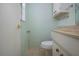 Small bathroom with white vanity and toilet at 2413 Aspinwall St # 2413, Sarasota, FL 34237