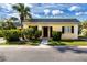 House exterior showcasing a well-maintained lawn at 2413 Aspinwall St # 2413, Sarasota, FL 34237