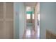 View down hallway to bathroom at 2413 Aspinwall St # 2413, Sarasota, FL 34237