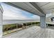 Balcony with water views and glass railings at 25 Tidy Island Blvd # 25, Bradenton, FL 34210