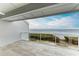 Balcony with water views and glass railings at 25 Tidy Island Blvd, Bradenton, FL 34210