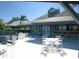 Community clubhouse with outdoor seating and bar at 25 Tidy Island Blvd, Bradenton, FL 34210