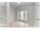 Bright entryway with tile flooring and modern front door at 25 Tidy Island Blvd # 25, Bradenton, FL 34210